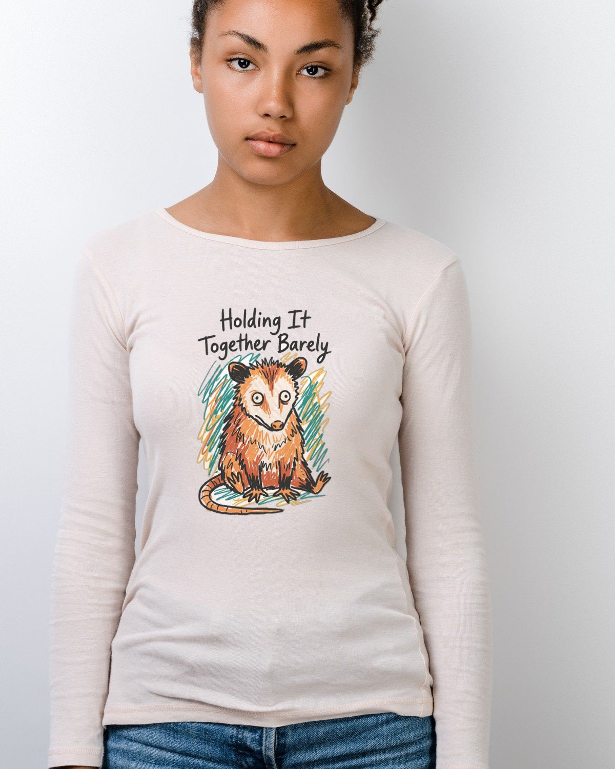 Holding It Together Crayon Opossum Long Sleeve — lifestyle photo