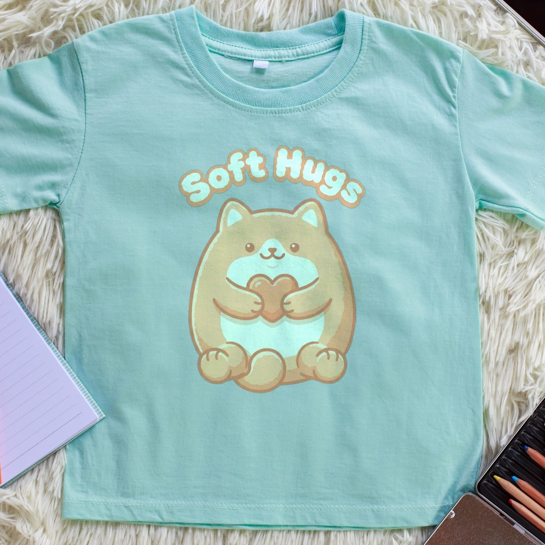 Soft Squeeze Support Plush Cat Kids Tee — lifestyle photo