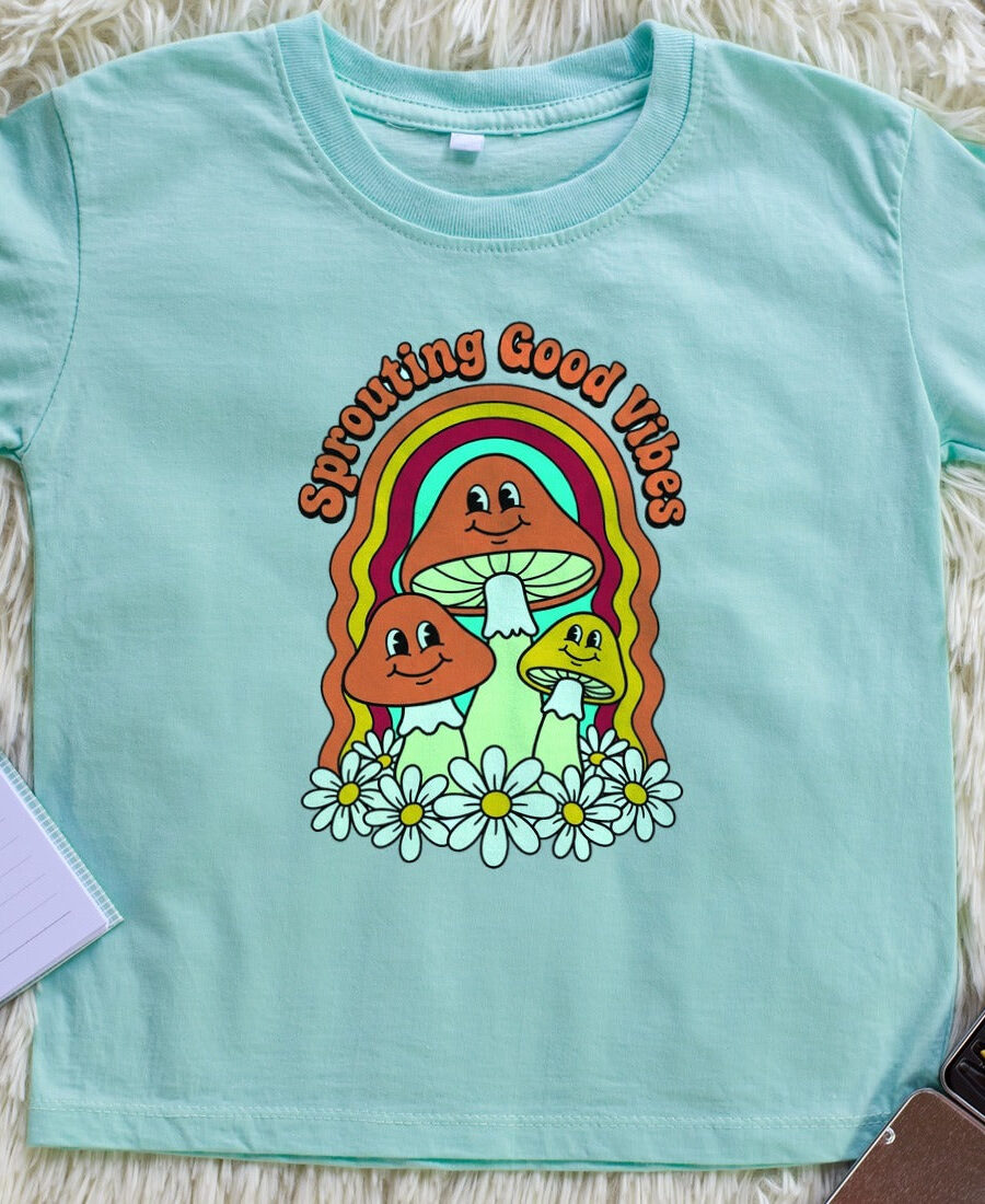 Sprouting Good Vibes Retro Mushroom Kids Tee — lifestyle photo