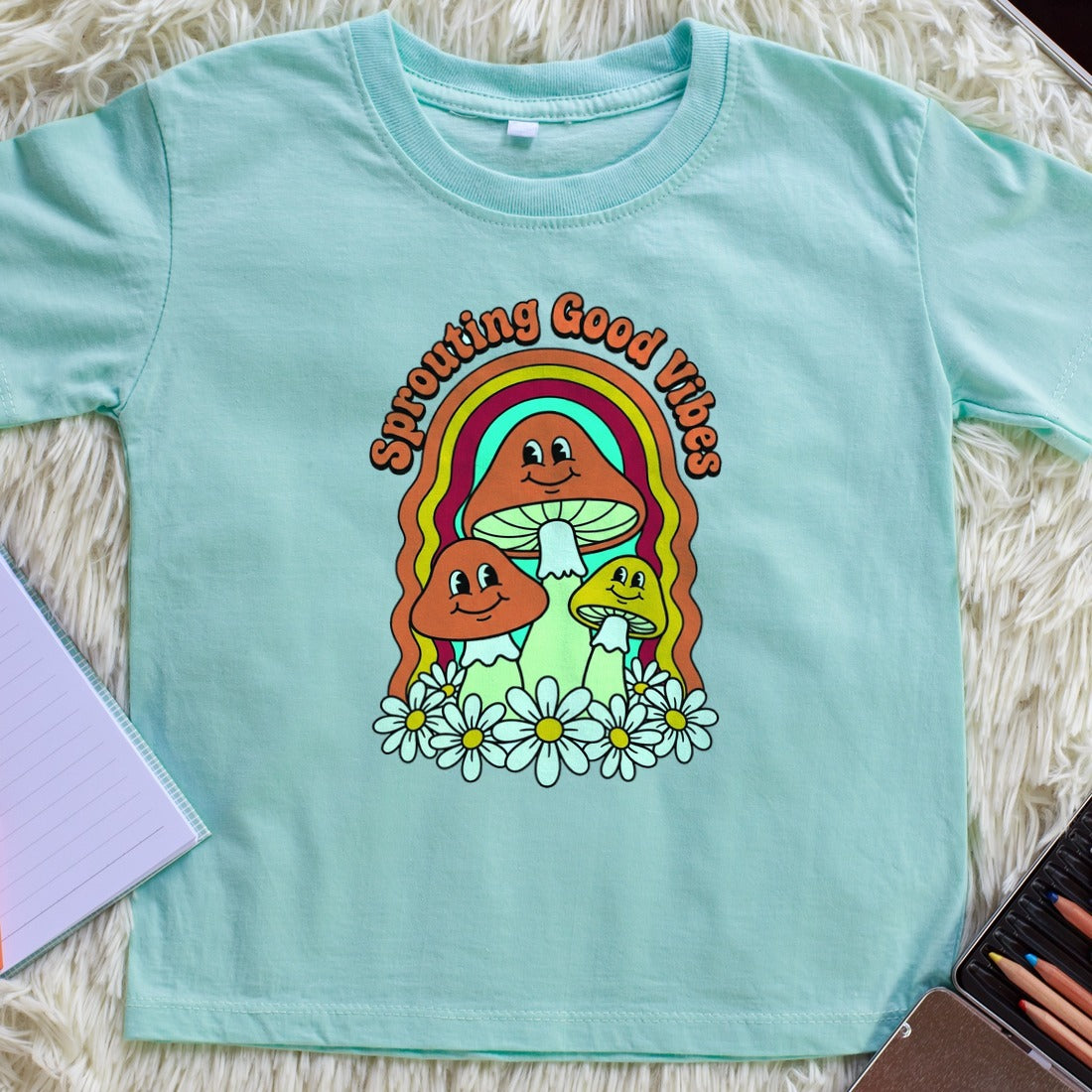 Sprouting Good Vibes Retro Mushroom Kids Tee — lifestyle photo
