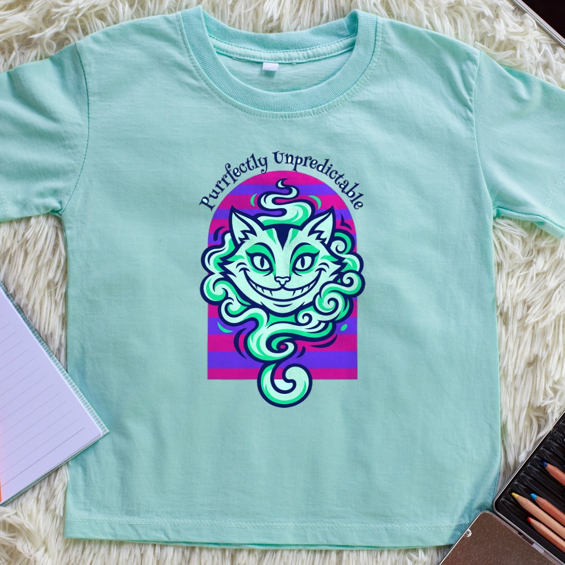 Unpredictable Trickster Striped Cat Tee Kids Tee — lifestyle photo