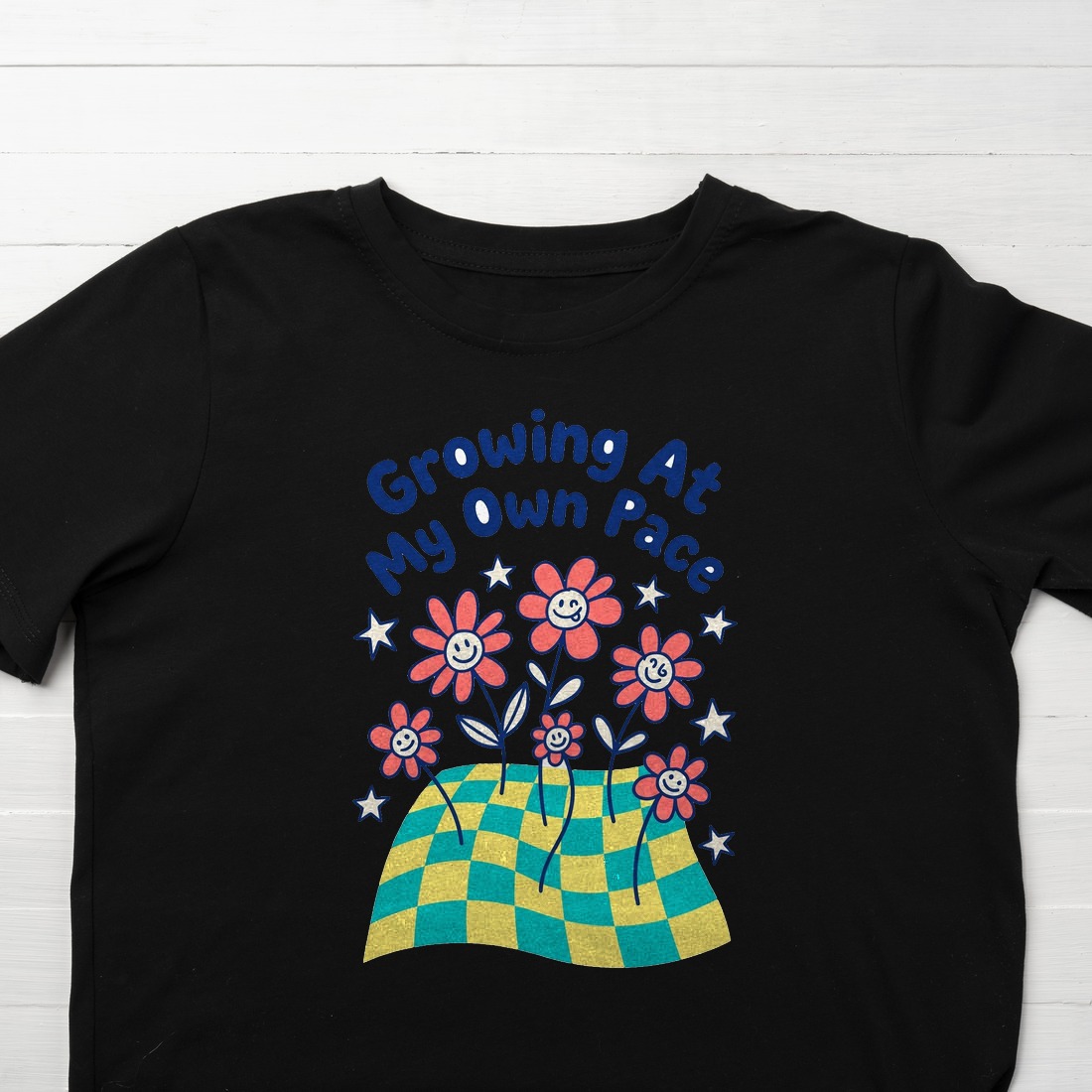 Growing At My Own Pace Wobbly Garden Kids Tee — lifestyle photo
