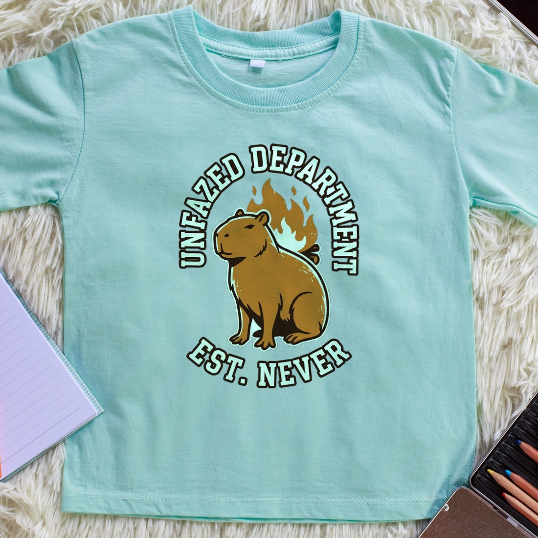 Unfazed Department Capybara Mascot Kids Tee — lifestyle photo