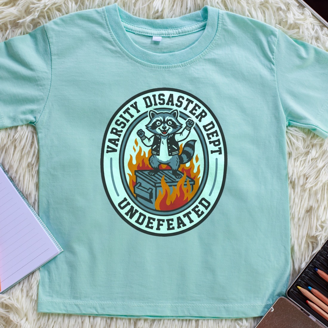 Varsity Disaster Dept Mascot Badge Kids Tee — lifestyle photo