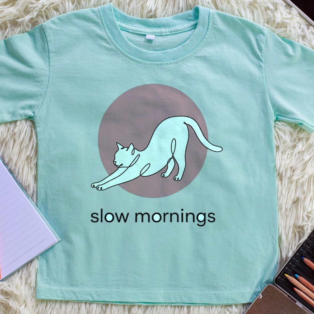 Minimalist Single-Line Stretching Cat Kids Tee — lifestyle photo
