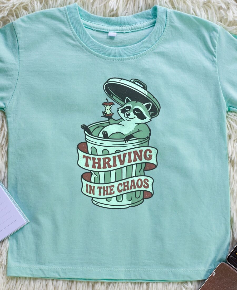 Thriving In The Chaos Raccoon Tee Kids Tee — lifestyle photo